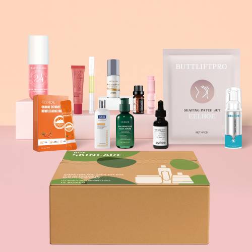 Skincare gift box with kraft lid, plus assorted lotion and serum bottles