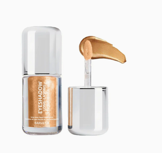 Liquid eyeshadow bottle with doe-foot applicator, gold shimmer swatch
