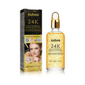 24K gold facial essence bottle with gold cap and matching box