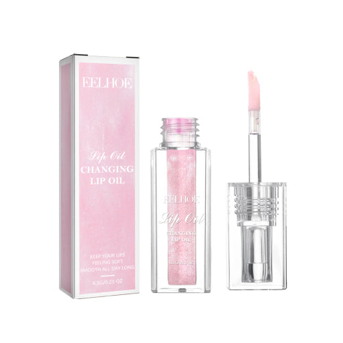 Color-changing lip oil in clear pink bottle with wand applicator, glossy