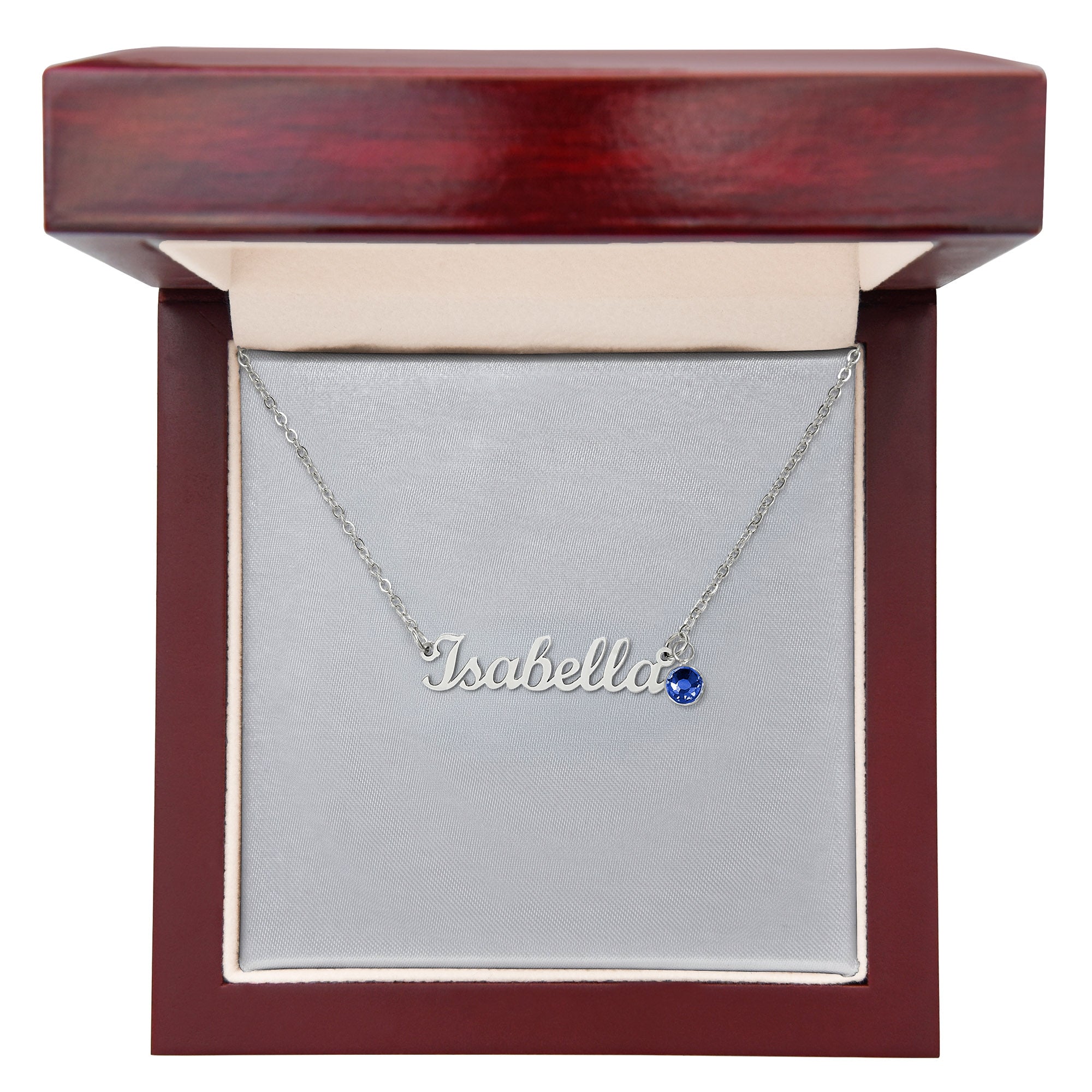 Silver name necklace with blue birthstone pendant reading "Isabella" in gift box