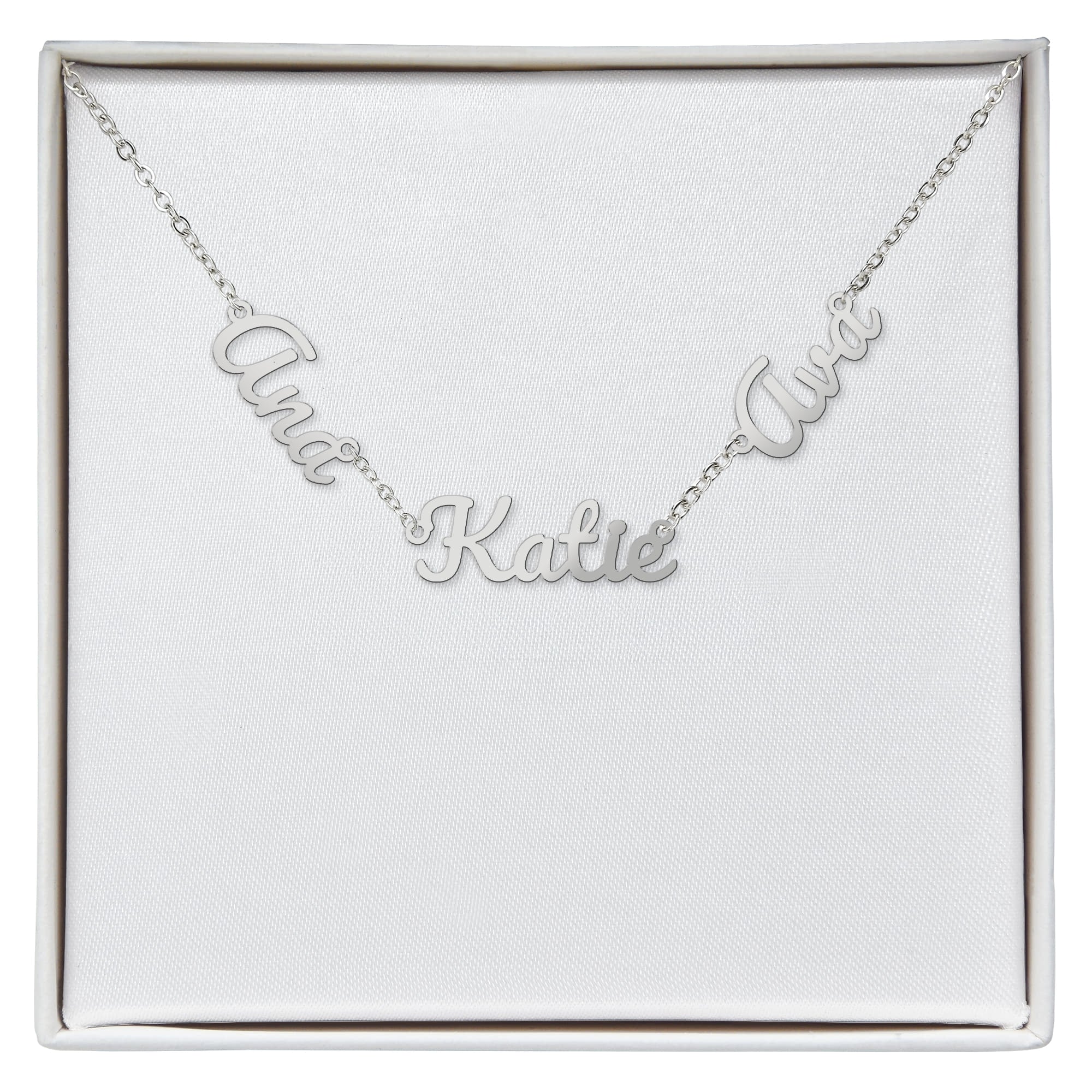 Silver-tone personalized name necklace with three script charms, shown in a gift box