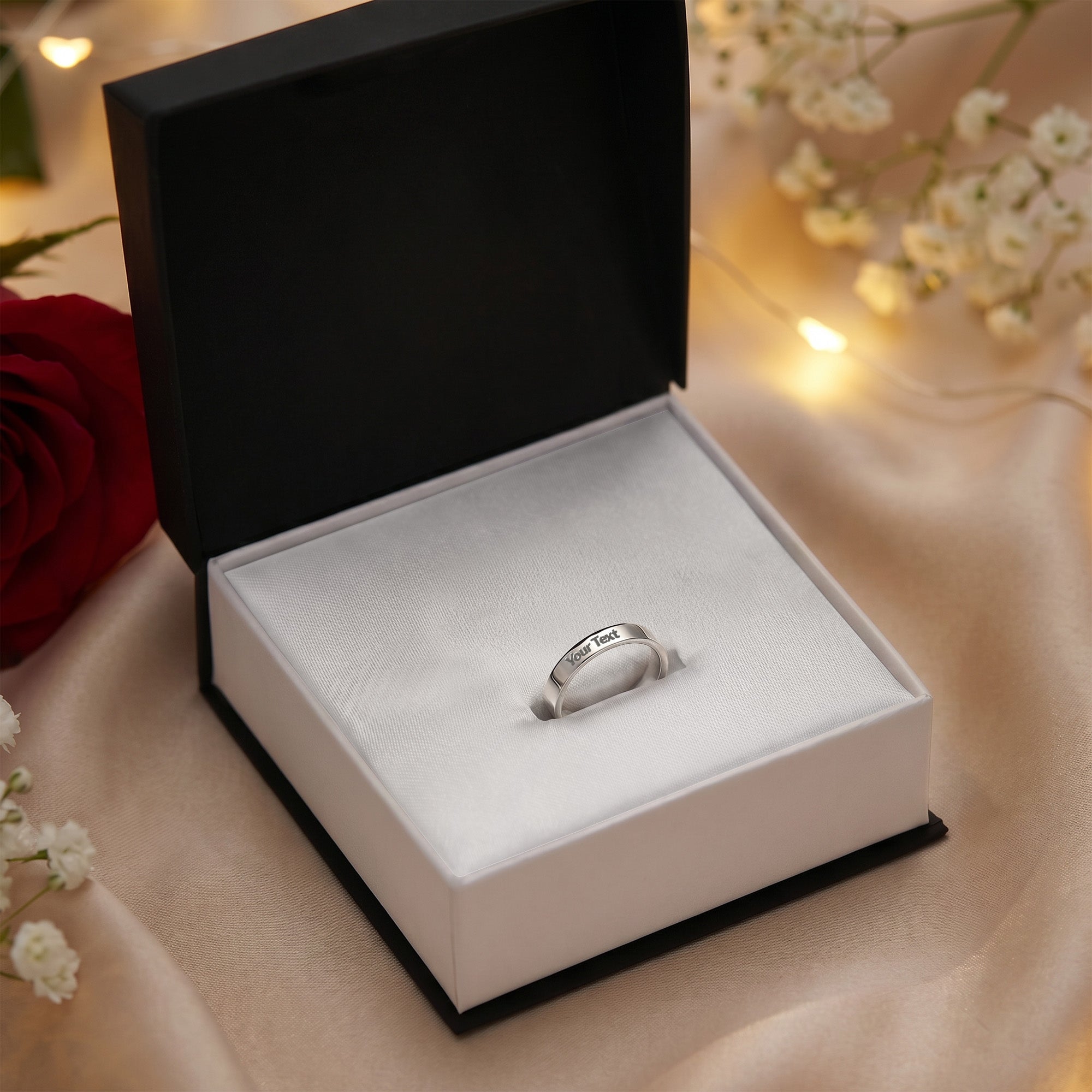 Engraved stainless steel ring with 'Your Text' in open gift box