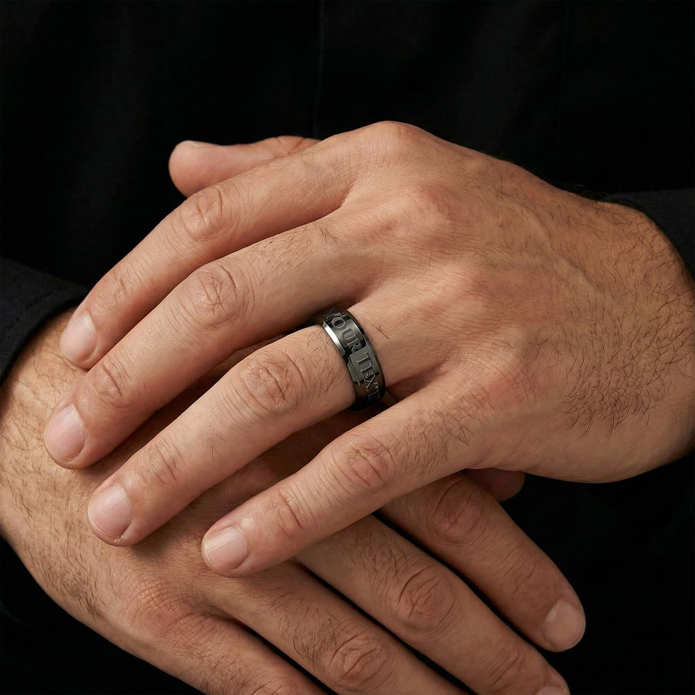 Men's engraved ring on hand, black plated finish with 'YOUR TEXT' engraving