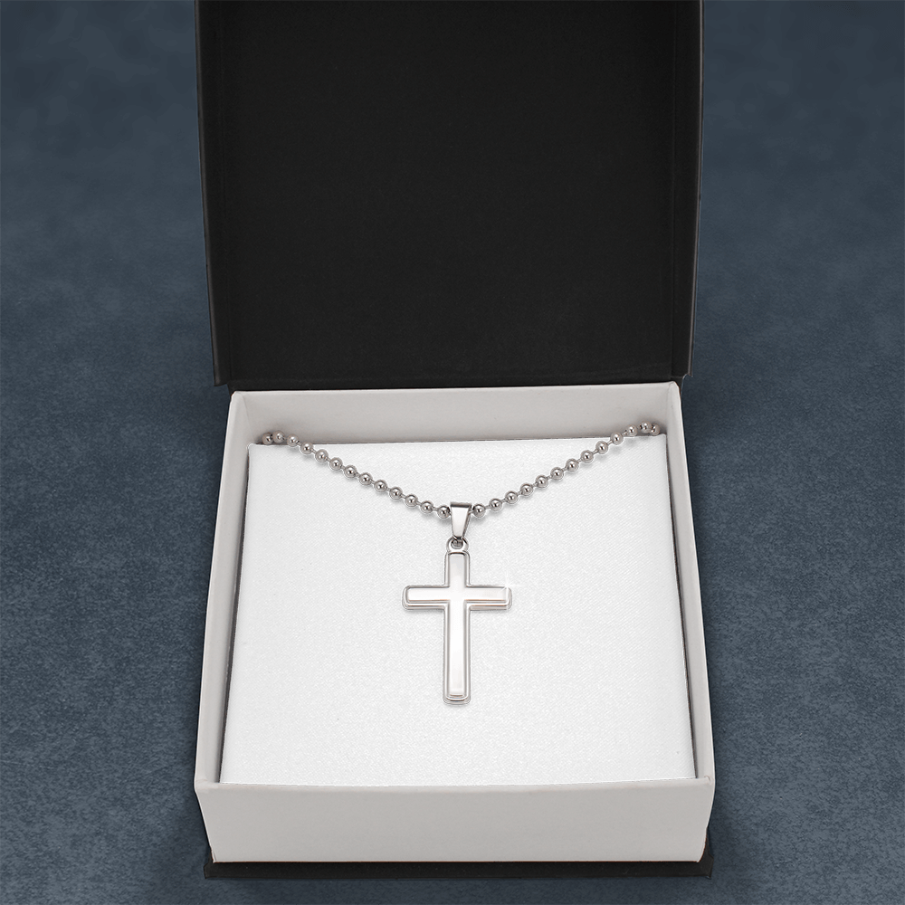 Silver cross pendant necklace with ball chain in an open white gift box