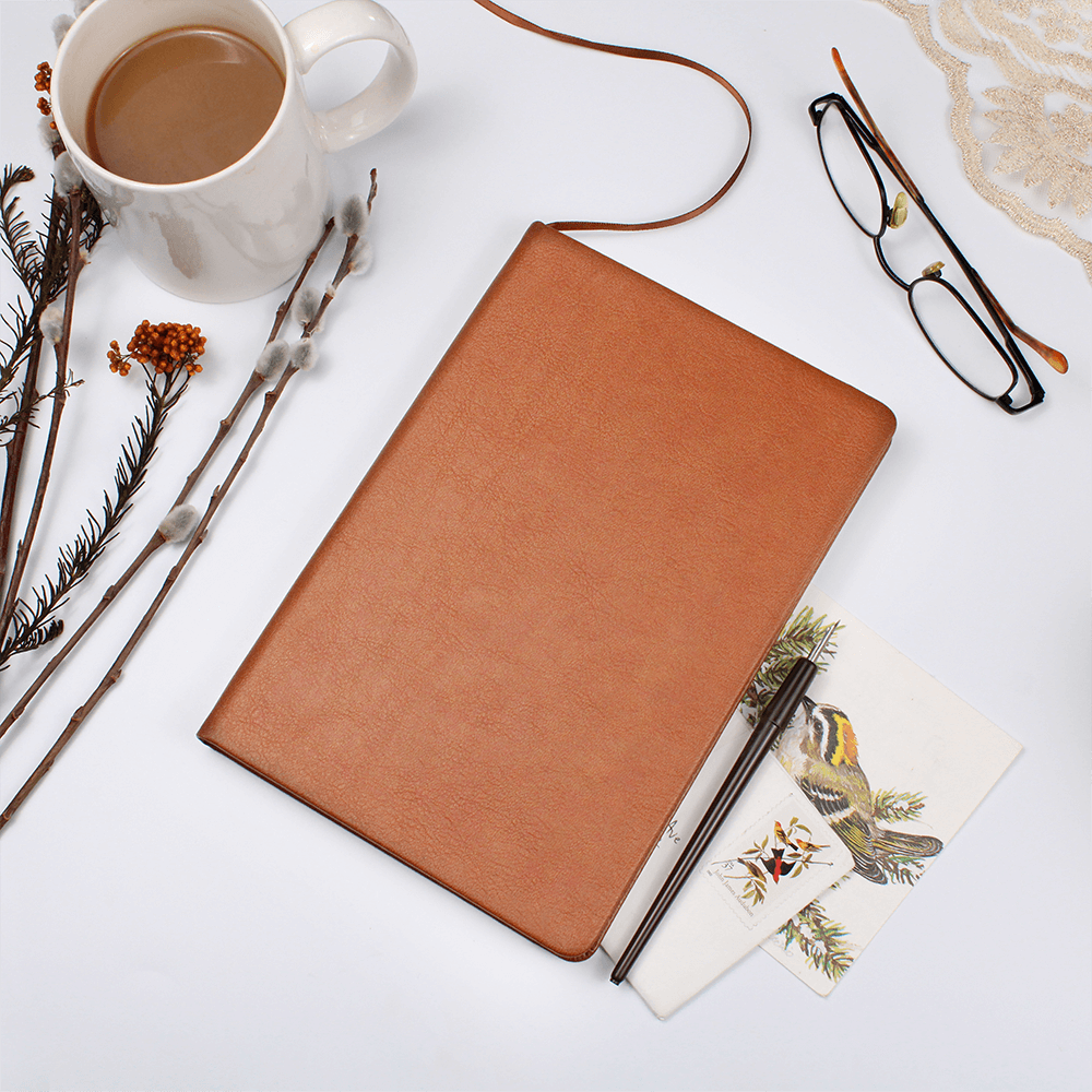 Orange vegan leather journal with elastic band and ribbon bookmark