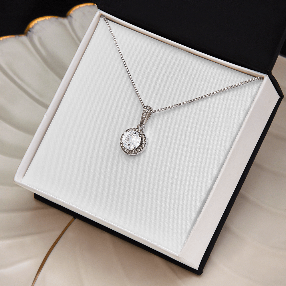 Silver-tone round crystal halo pendant necklace with teardrop bail on thin chain