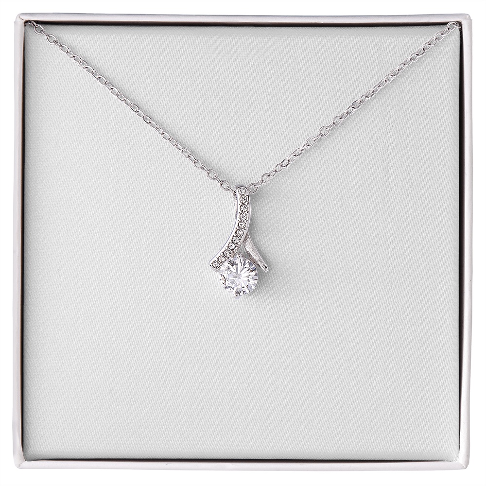 White gold necklace with teardrop pendant and clear round stone, cable chain