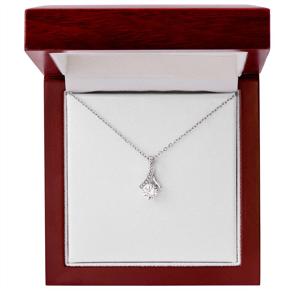 White gold necklace with teardrop pendant and round clear stone, cable chain