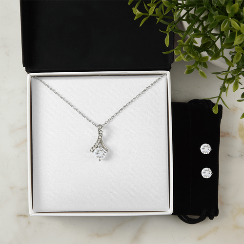 Necklace and earring set with teardrop pendant and two round stud earrings