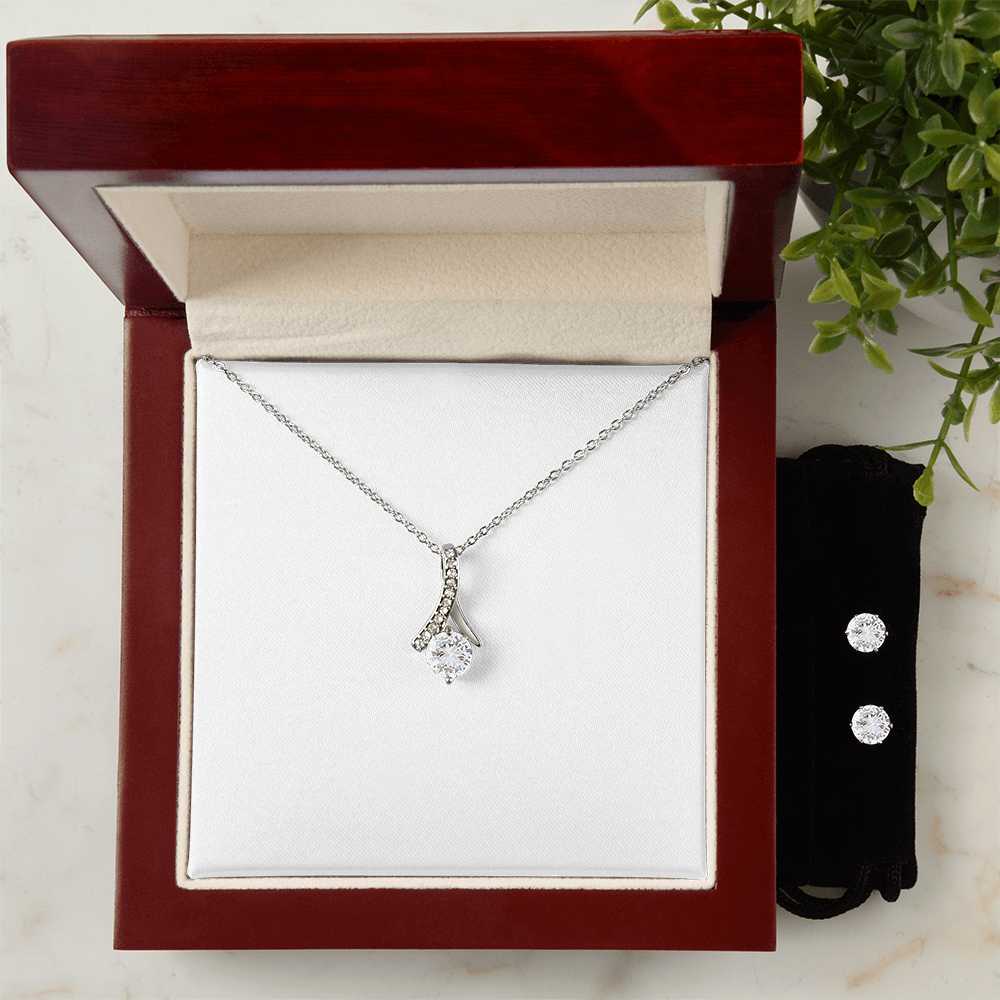 Necklace and earring set with small teardrop pendant and matching round stud earrings