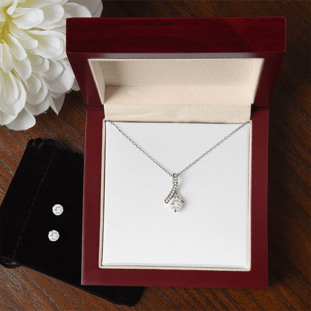 Necklace and earring set with dangling teardrop charm pendant and round stud earrings