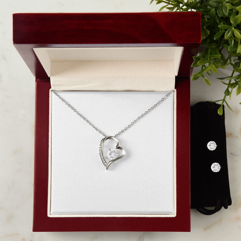 Heart-shaped CZ pendant necklace with round center stone, silver-tone chain