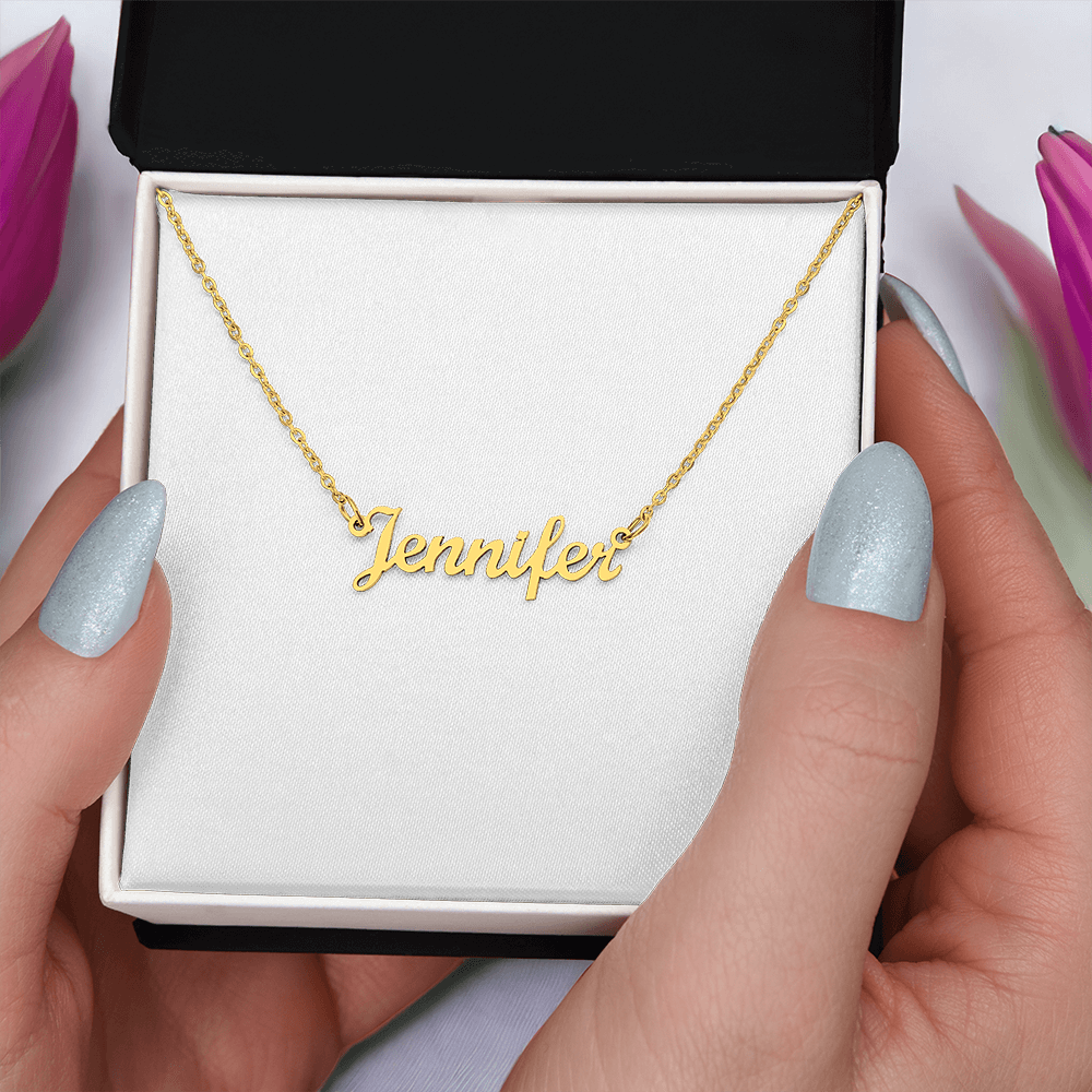 Gold-tone name pendant necklace with “Jennifer” script on a chain