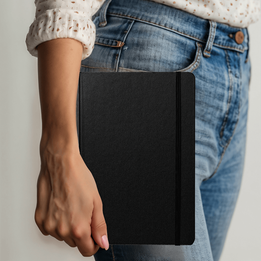 Black textured hardcover journal with spine band and ribbon bookmark