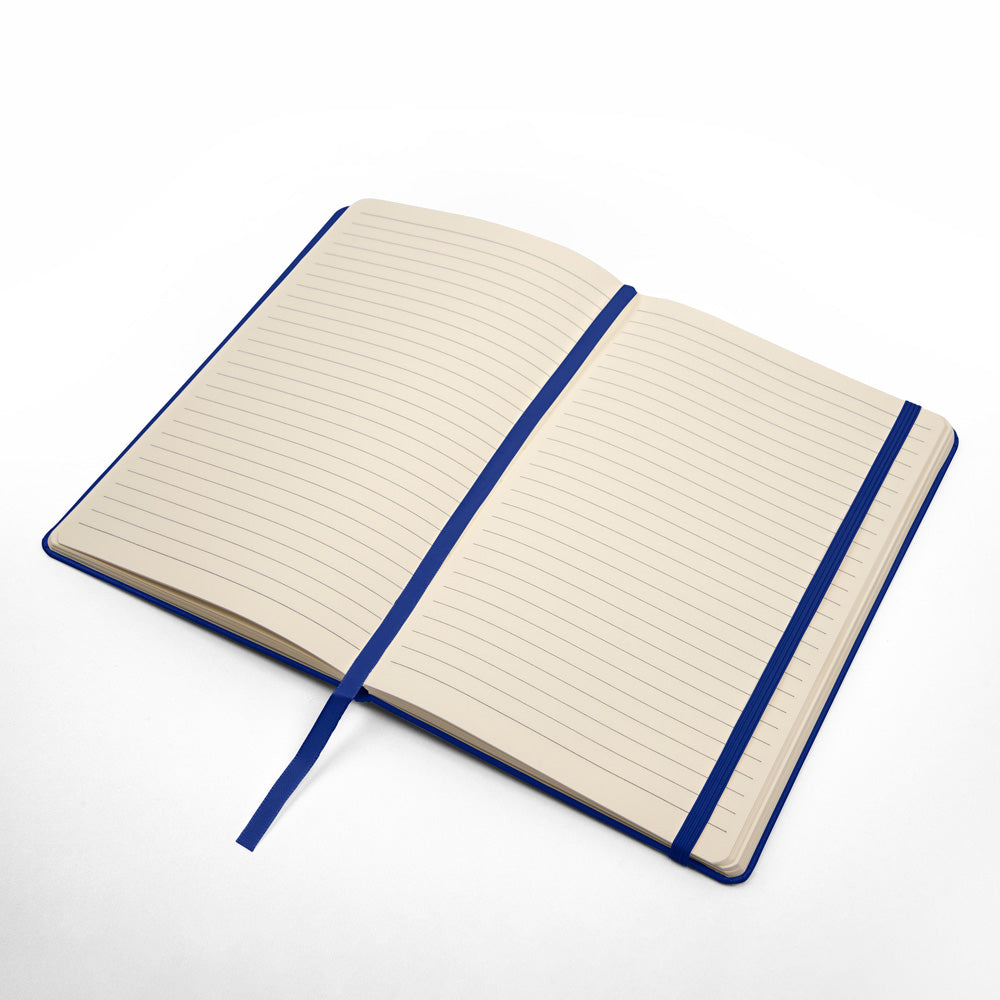 Open royal blue journal with beige lined pages and matching binding