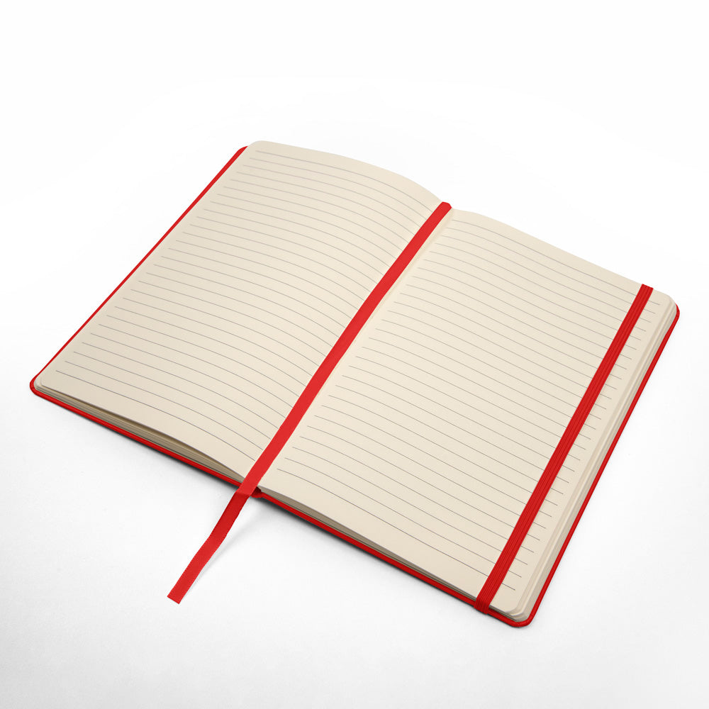 Open red journal with beige lined pages and red cover binding