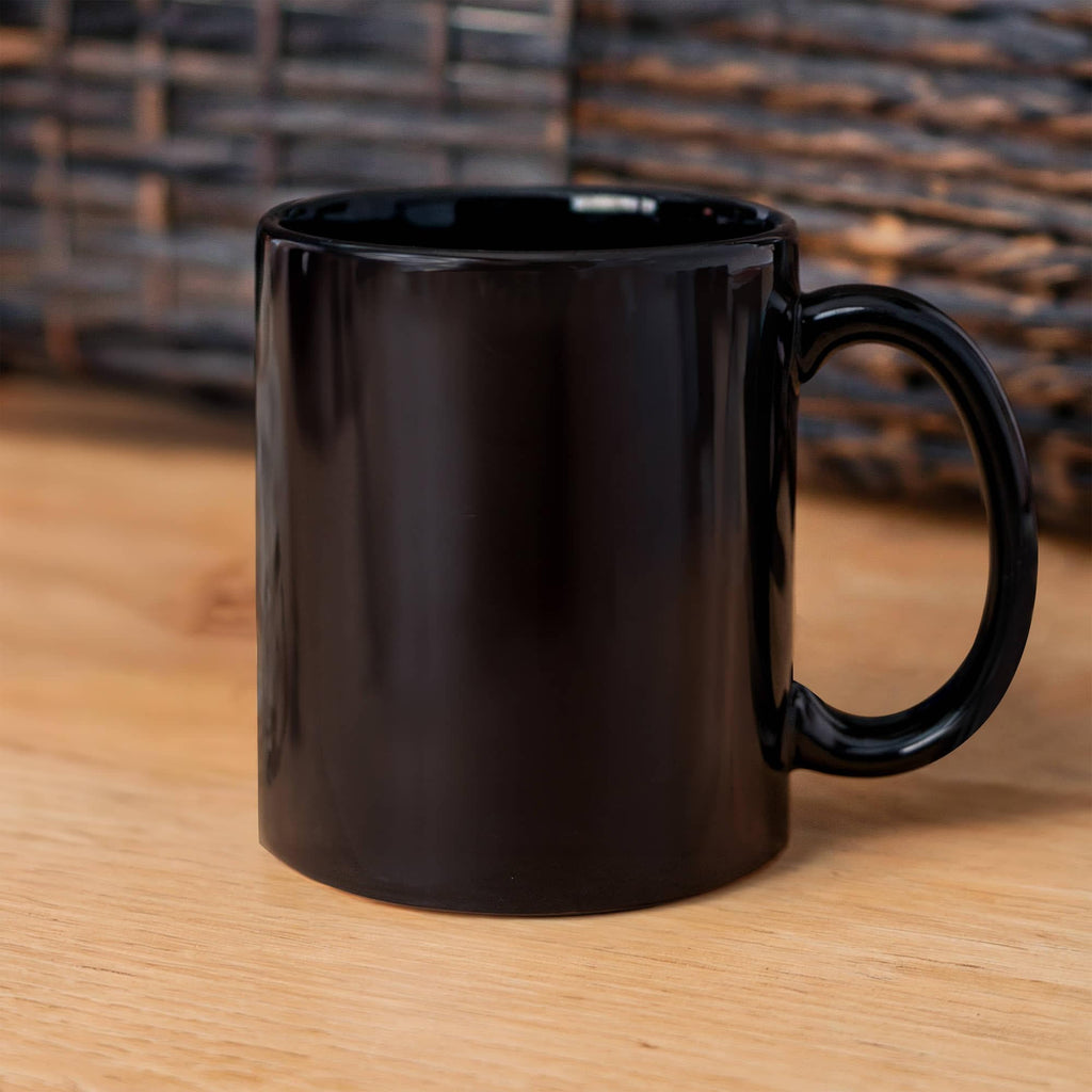 Black glossy ceramic mug, front-right view with curved handle