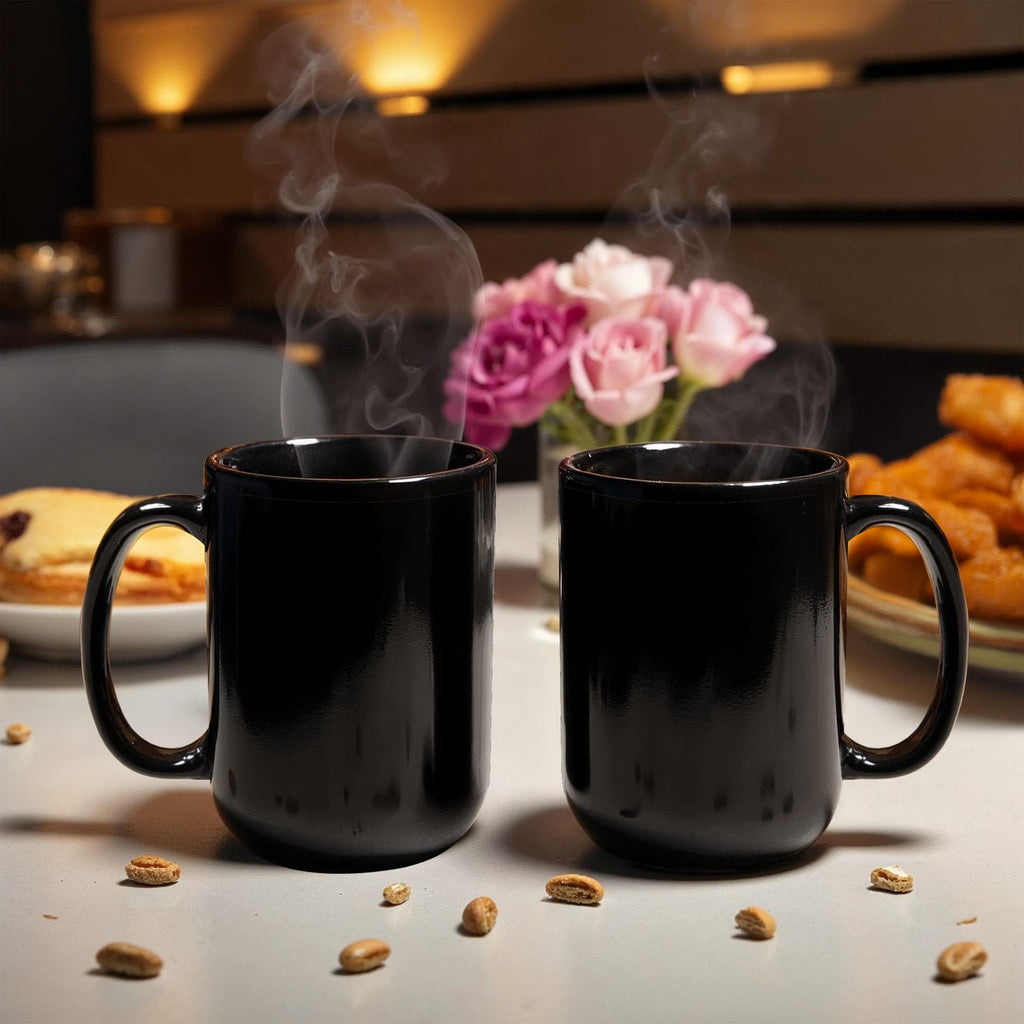 Black glossy ceramic mug pair, steam rising above the cups