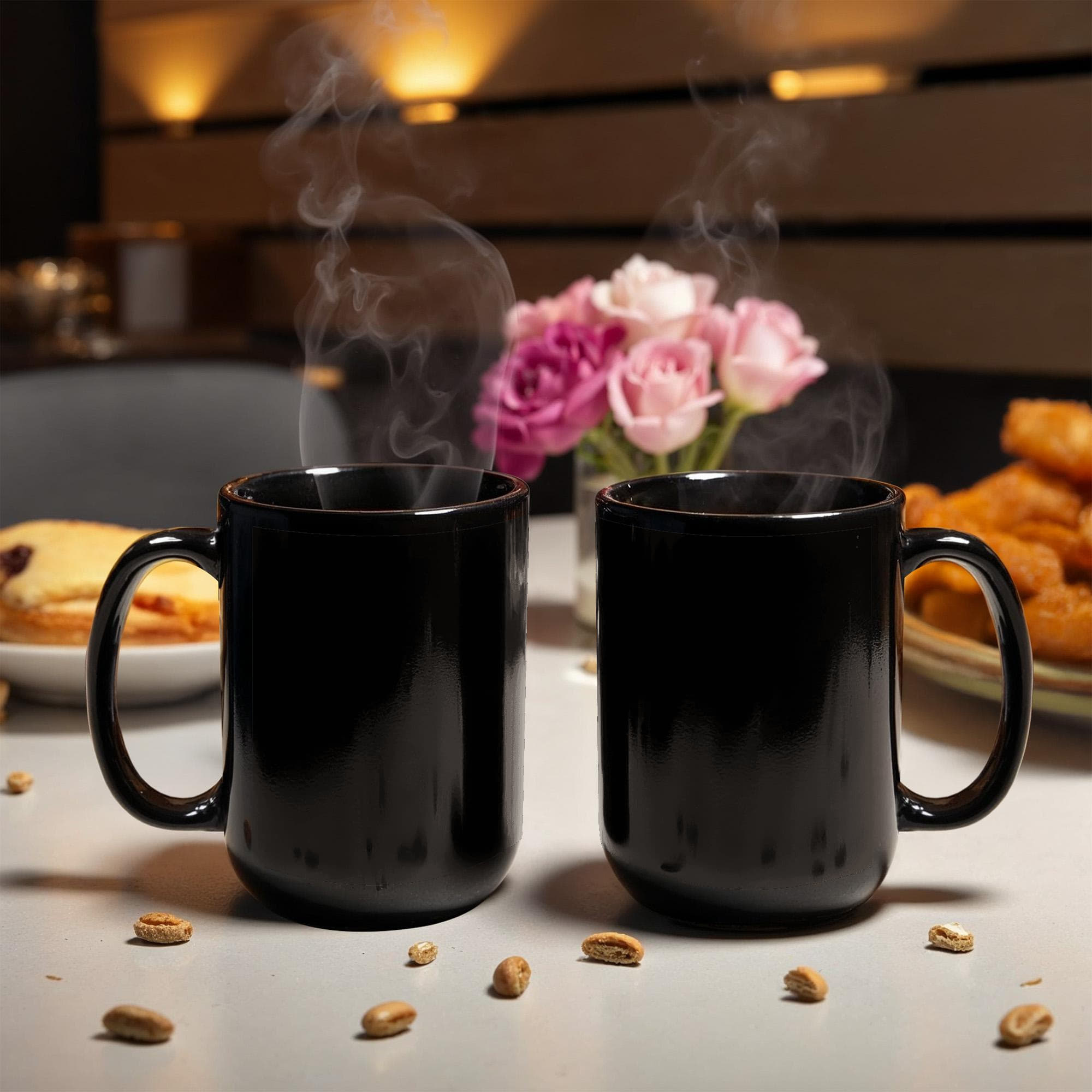 Black glossy ceramic mug pair, steam rising above the cups