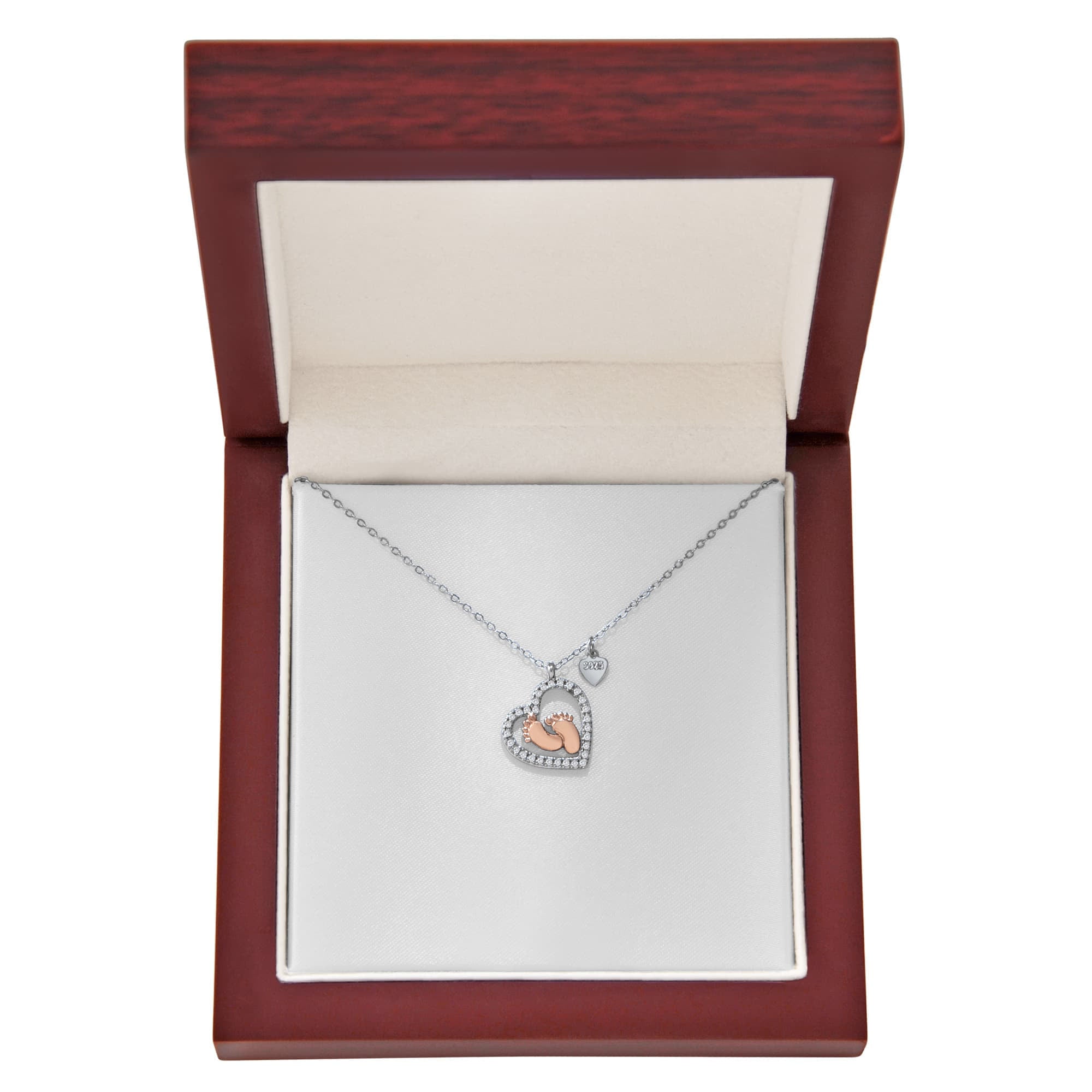 Silver heart pendant necklace with small baby feet charm on a fine chain