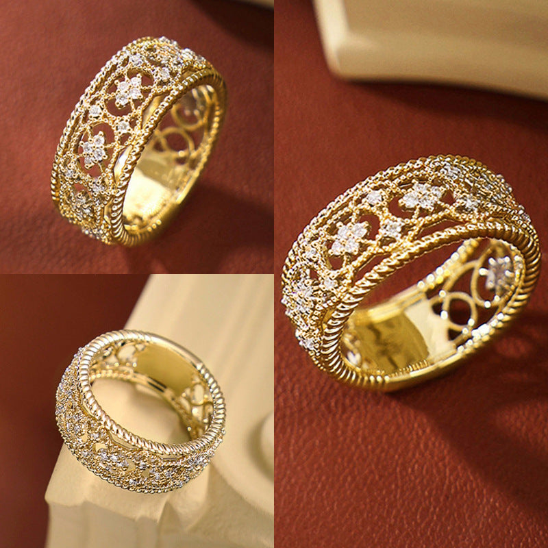 Gold-tone openwork ring shown from multiple angles with carved floral cutouts