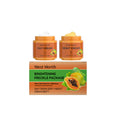 Facial cream set with two orange jars and brightening freckle package box