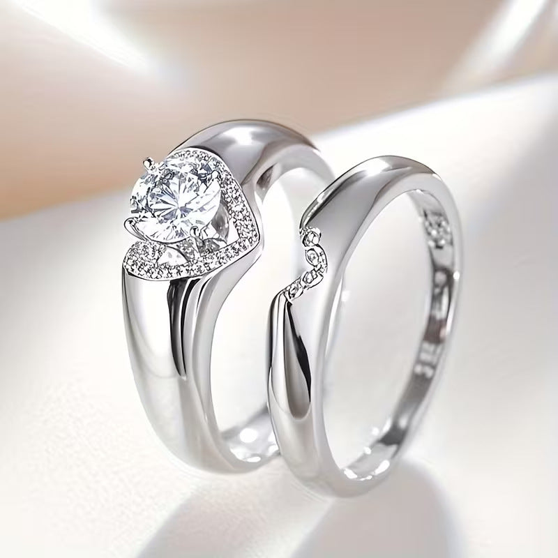 Silver-tone two-piece couples ring set with heart zircon halo and round center stone